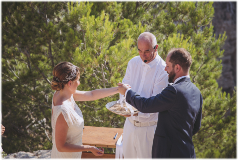 Pic:: Couple pouring sand into a bottle - Two becoming one.