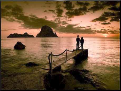 Pic: Couple gaze to Es Vedra at Sunset